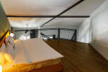 Experience modern luxury in this stylish loft bedroom.