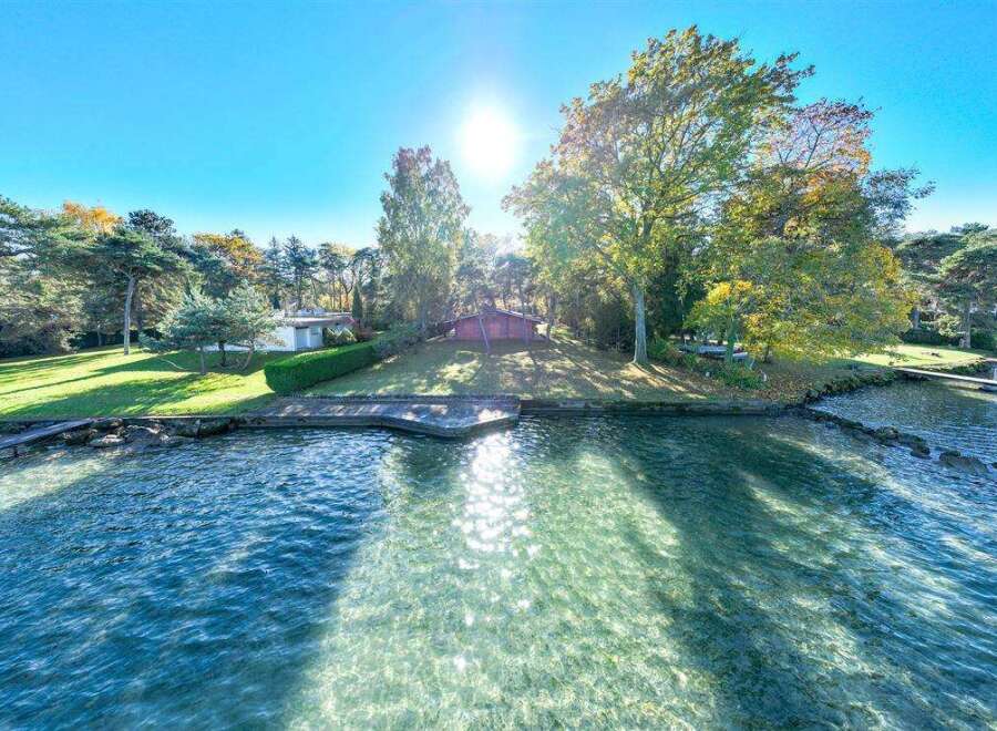 Lakefront property with stunning views and a private dock.