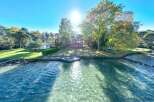 Lakefront property with stunning views and a private dock.