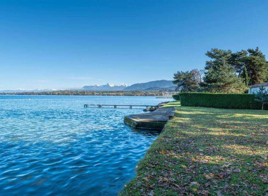 Lakefront property with private access and stunning mountain views.