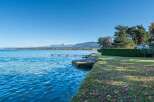Lakefront property with private access and stunning mountain views.