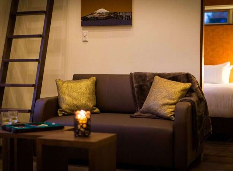 Cozy apartment featuring a comfortable couch, perfect for relaxing evenings.