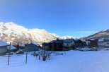 This charming mountain village home offers breathtaking views of the snow-capped Alps.