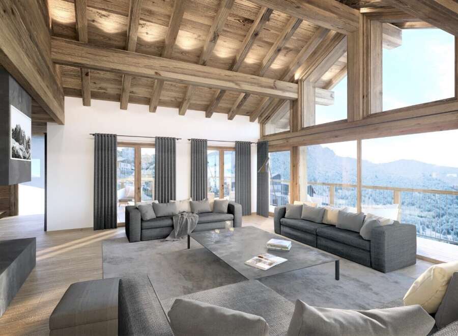 Luxury chalet with breathtaking mountain views and expansive windows.