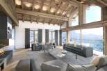 Luxury chalet with breathtaking mountain views and expansive windows.