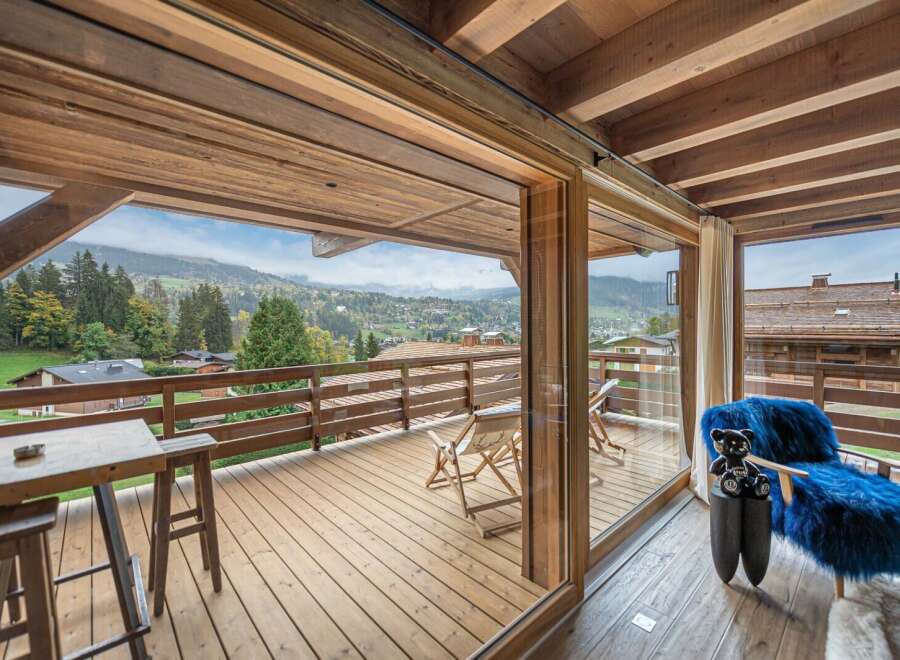 Luxury chalet with breathtaking mountain views and spacious deck.