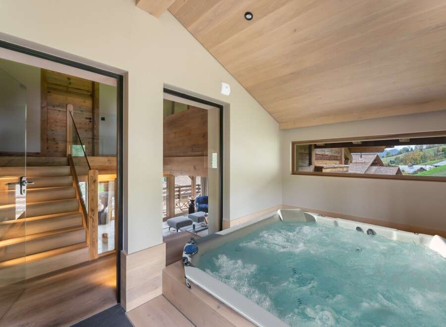 Luxurious chalet with a private indoor hot tub, perfect for relaxation and enjoying stunning views.