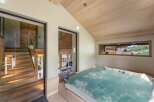 Luxurious chalet with a private indoor hot tub, perfect for relaxation and enjoying stunning views.
