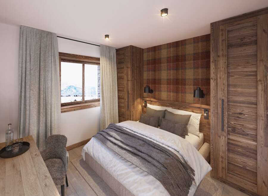 Cozy mountain chalet bedroom with stunning views.