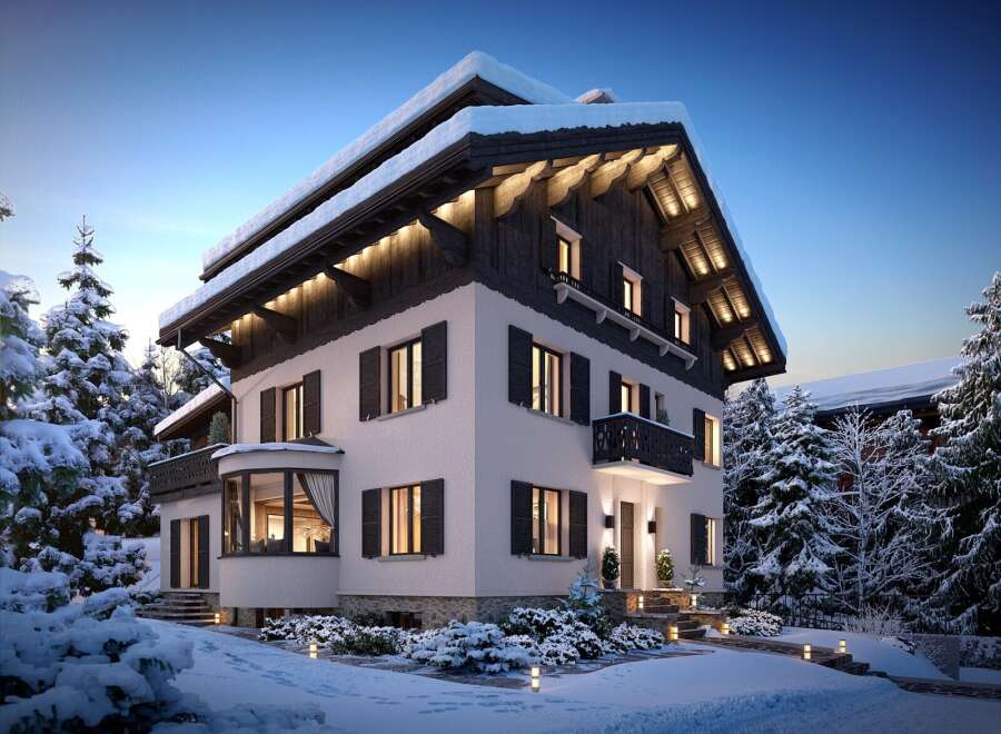 Luxury chalet in snowy mountain setting.