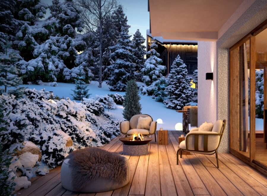 Cozy up by the fire pit on this stunning snow-covered deck, complete with comfortable seating and breathtaking mountain views.