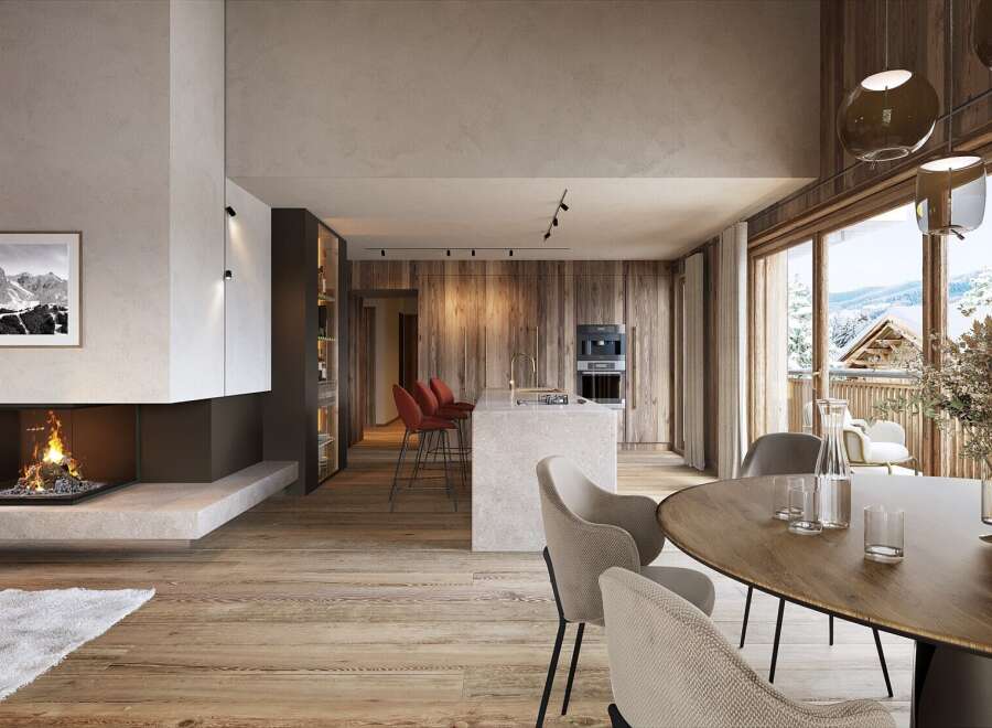 This stunning property boasts a spacious open-plan living area with a cozy fireplace, perfect for relaxing after a day on the slopes.