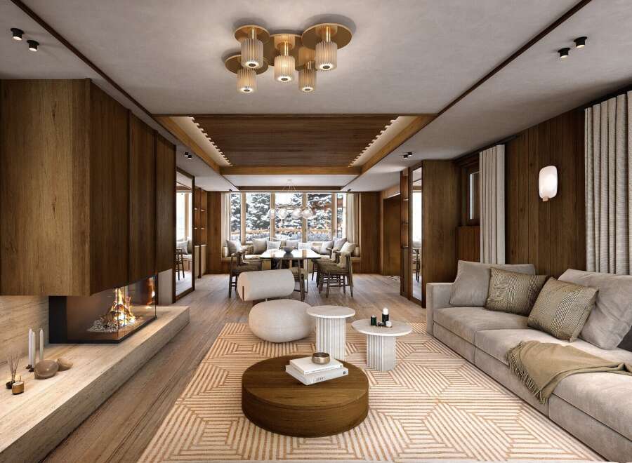 Luxurious chalet living room with a stunning fireplace, comfortable seating, and large windows offering breathtaking views.