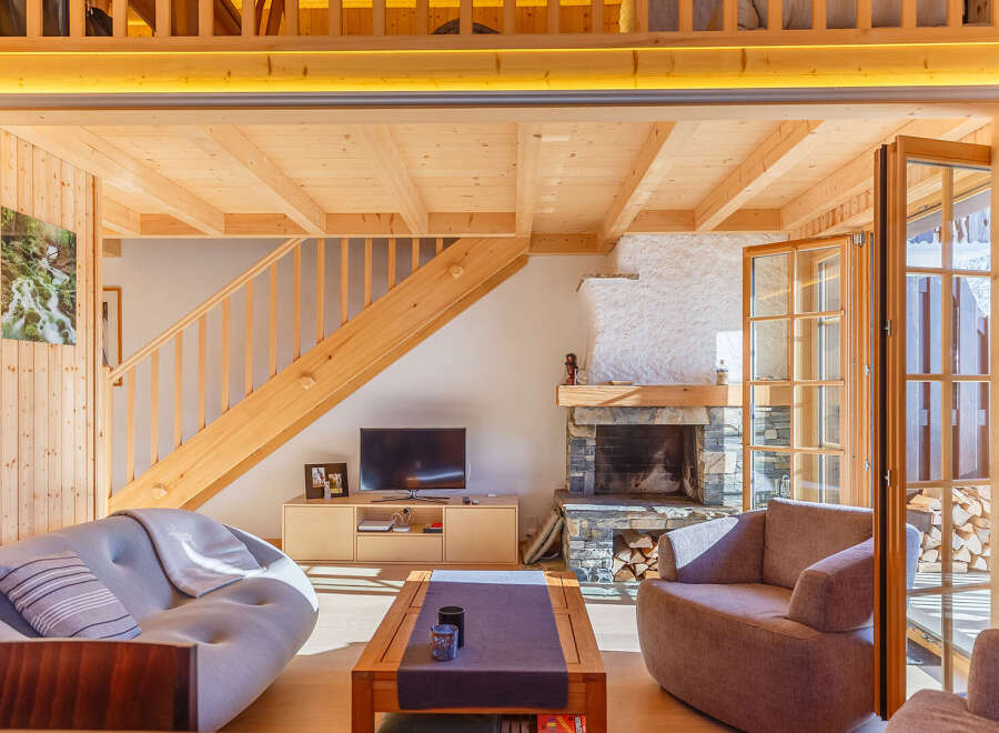 Experience the warmth of this stunning wooden chalet, perfect for a cozy getaway.