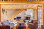 Experience the warmth of this stunning wooden chalet, perfect for a cozy getaway.