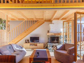 Experience the warmth of this stunning wooden chalet, perfect for a cozy getaway.