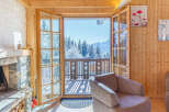 Experience the tranquility of a cozy cabin with stunning mountain views.