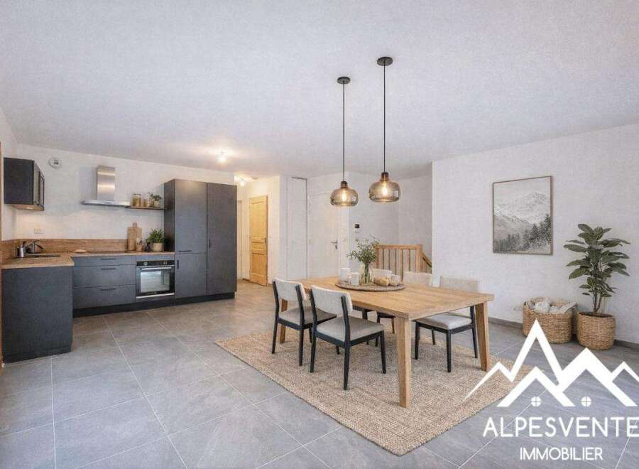 Discover this stunning property featuring a modern kitchen with sleek cabinetry and a cozy dining area.