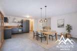 Discover this stunning property featuring a modern kitchen with sleek cabinetry and a cozy dining area.