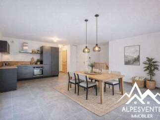Discover this stunning property featuring a modern kitchen with sleek cabinetry and a cozy dining area.