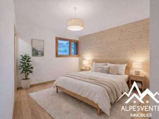 Discover the charm of this cozy bedroom, featuring a warm wooden accent wall and a plush rug.