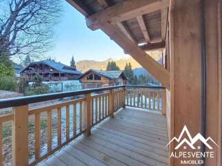 Enjoy breathtaking mountain views from this charming balcony.