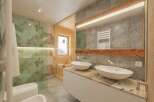 This luxurious bathroom features a modern design with a touch of rustic charm.