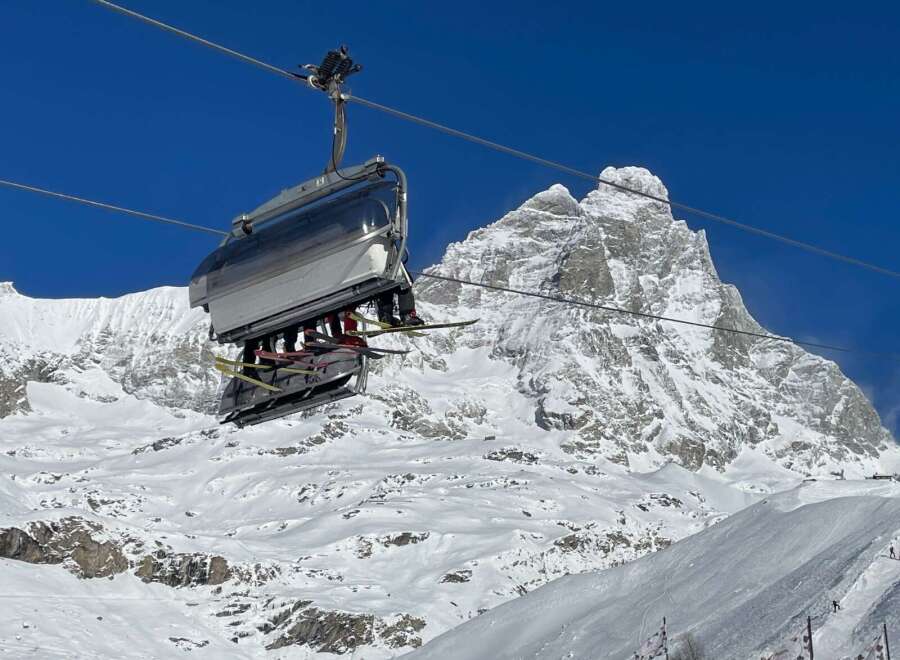 Enjoy breathtaking mountain views from this ski lift.