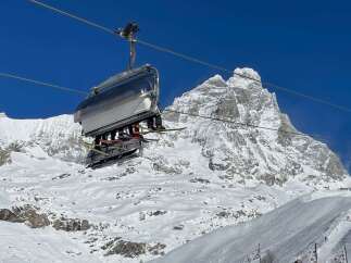 Enjoy breathtaking mountain views from this ski lift.
