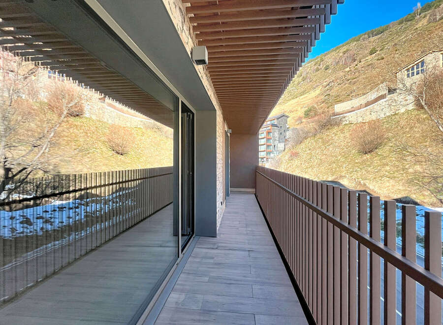 Enjoy breathtaking mountain views from this stunning balcony.