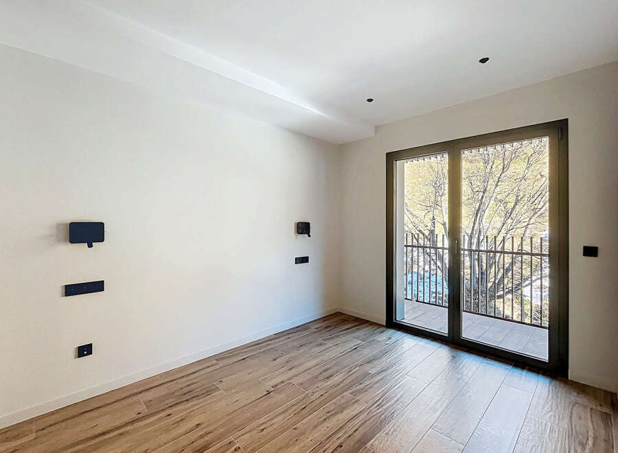 This modern room features a sleek design with a focus on natural light and contemporary finishes.