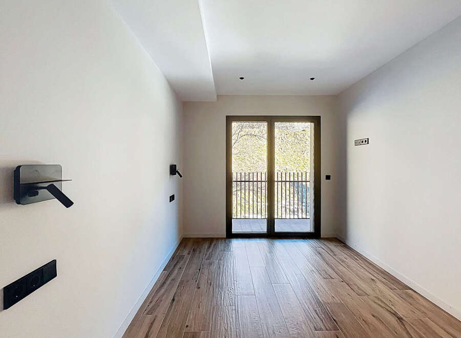 Discover the elegance of this modern property, featuring a bright and airy interior with sleek design elements.