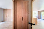 This stunning property boasts sleek, modern design with light oak wood finishes throughout.
