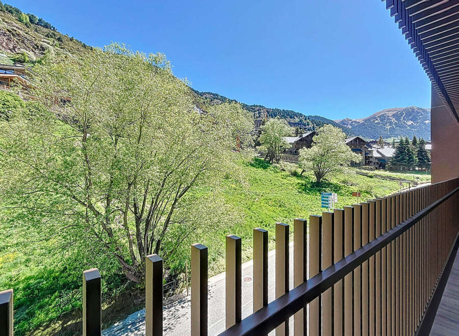Mountain view balcony with modern railing.