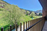 Mountain view balcony with modern railing.