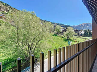 Mountain view balcony with modern railing.