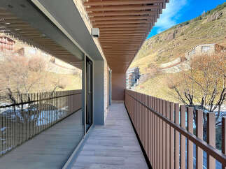 Enjoy breathtaking mountain views from this stunning balcony.