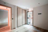 Discover this beautifully designed property featuring a modern interior with light wood flooring and a spacious layout.