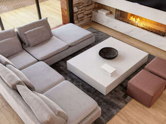 Modern living room with a spacious sectional sofa, a sleek white coffee table, and a stunning fireplace.