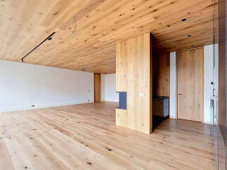 This stunning property boasts a modern design with exquisite wooden accents throughout.