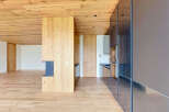This stunning modern home boasts a seamless blend of natural wood and sleek, contemporary design.