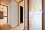 This stunning property boasts a modern interior with a focus on natural materials.