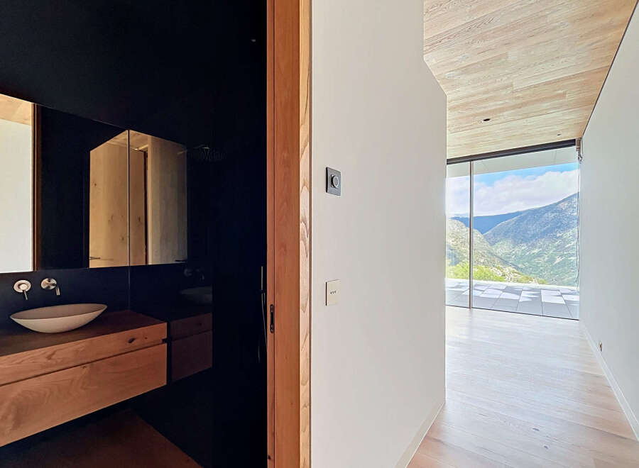 This stunning property boasts a modern design with luxurious finishes.