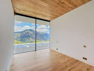 Experience breathtaking mountain views from this stunning property.