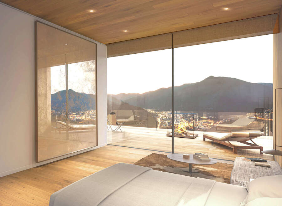 Luxury mountaintop bedroom with breathtaking panoramic views.