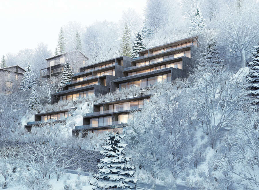 Luxury apartments nestled in a snowy mountainside setting.