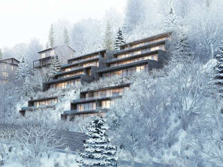 Luxury apartments nestled in a snowy mountainside setting.