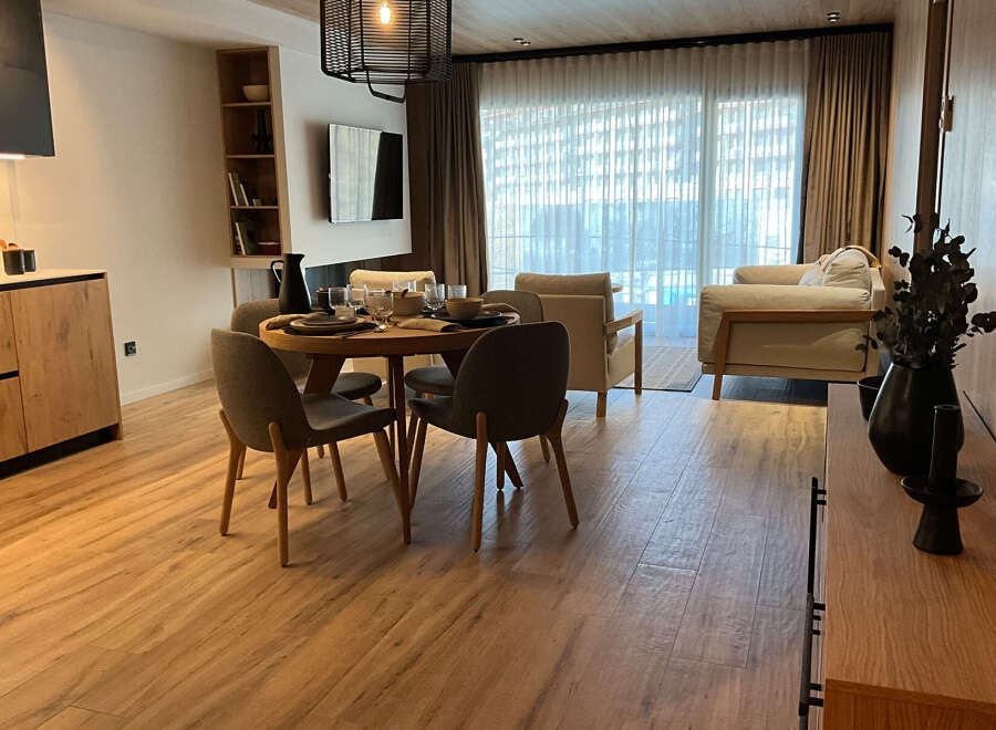 Experience modern living in this stylish property, featuring a beautifully designed dining area perfect for entertaining.