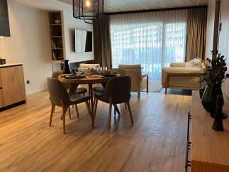 Experience modern living in this stylish property, featuring a beautifully designed dining area perfect for entertaining.