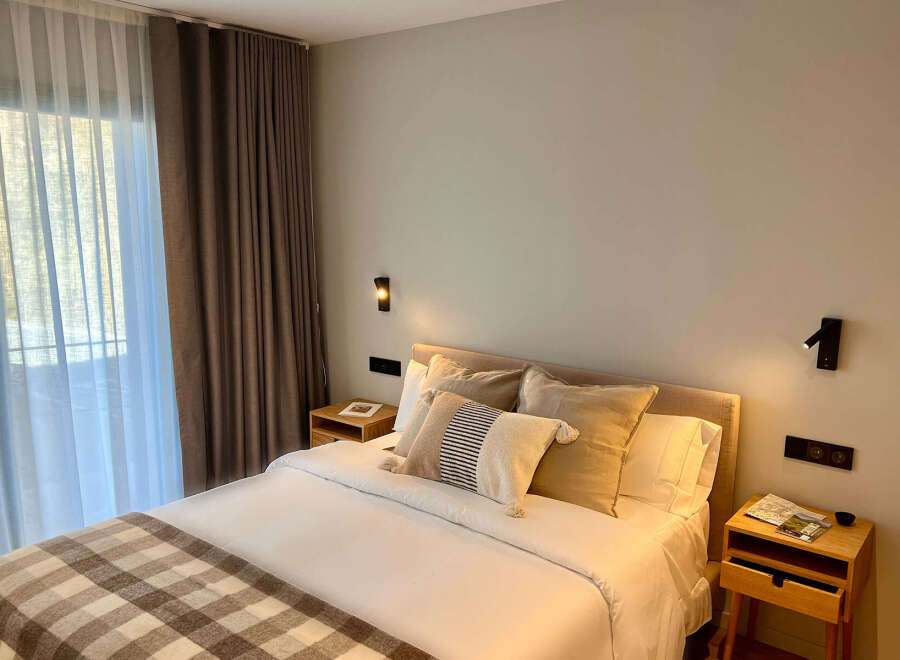 Experience comfort and style in this inviting bedroom.